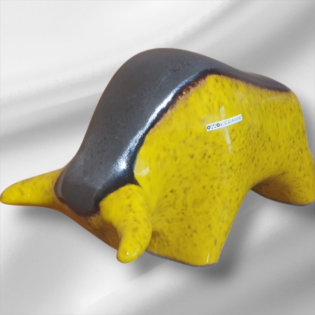 Vintage Otto Keramik bull sculpture in yellow and black glaze, West German fat lava ceramic, circa 1970s.