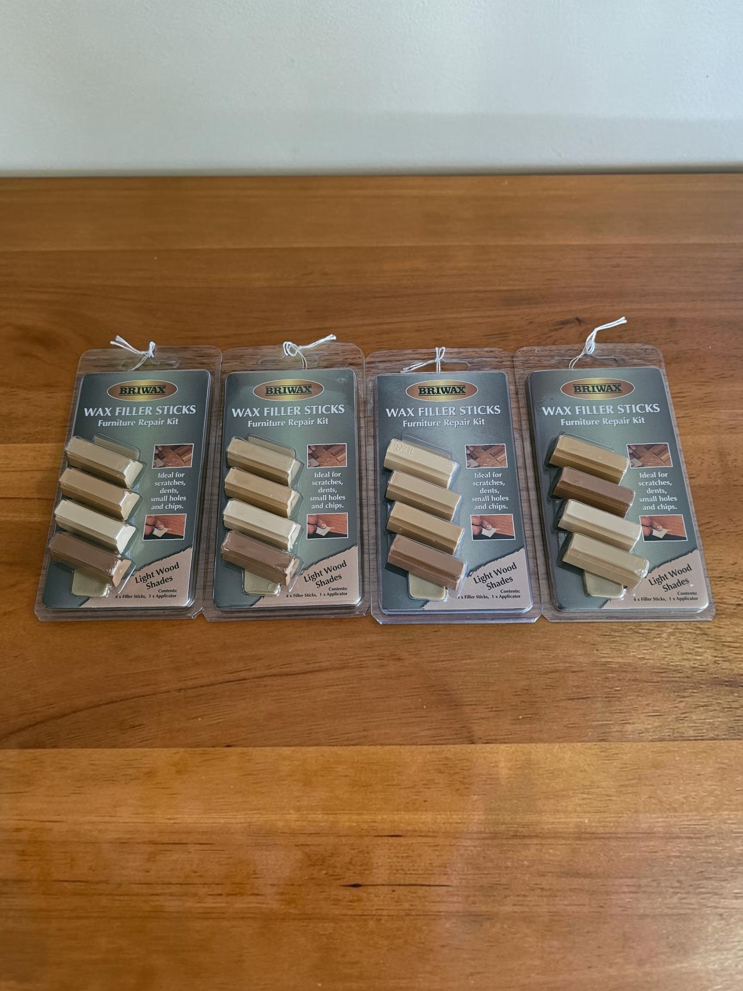 Briwax Wax Filler Sticks Light Wood Shades furniture repair kit with four wax sticks and applicator for repairing scratches, dents and chips.