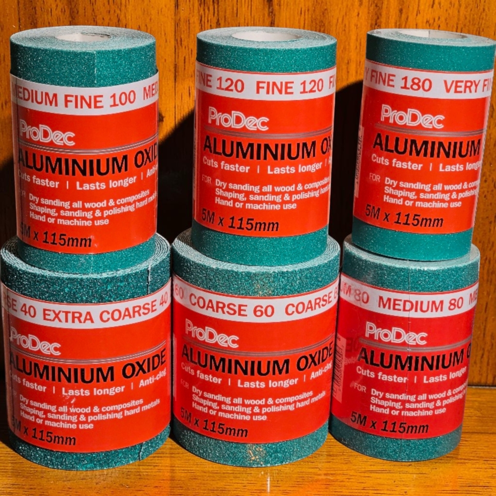 ProDec Aluminium Oxide Sandpaper Rolls 5m x 115mm in 40, 60, 80, 100, 120 and 180 grit for furniture restoration and sanding.